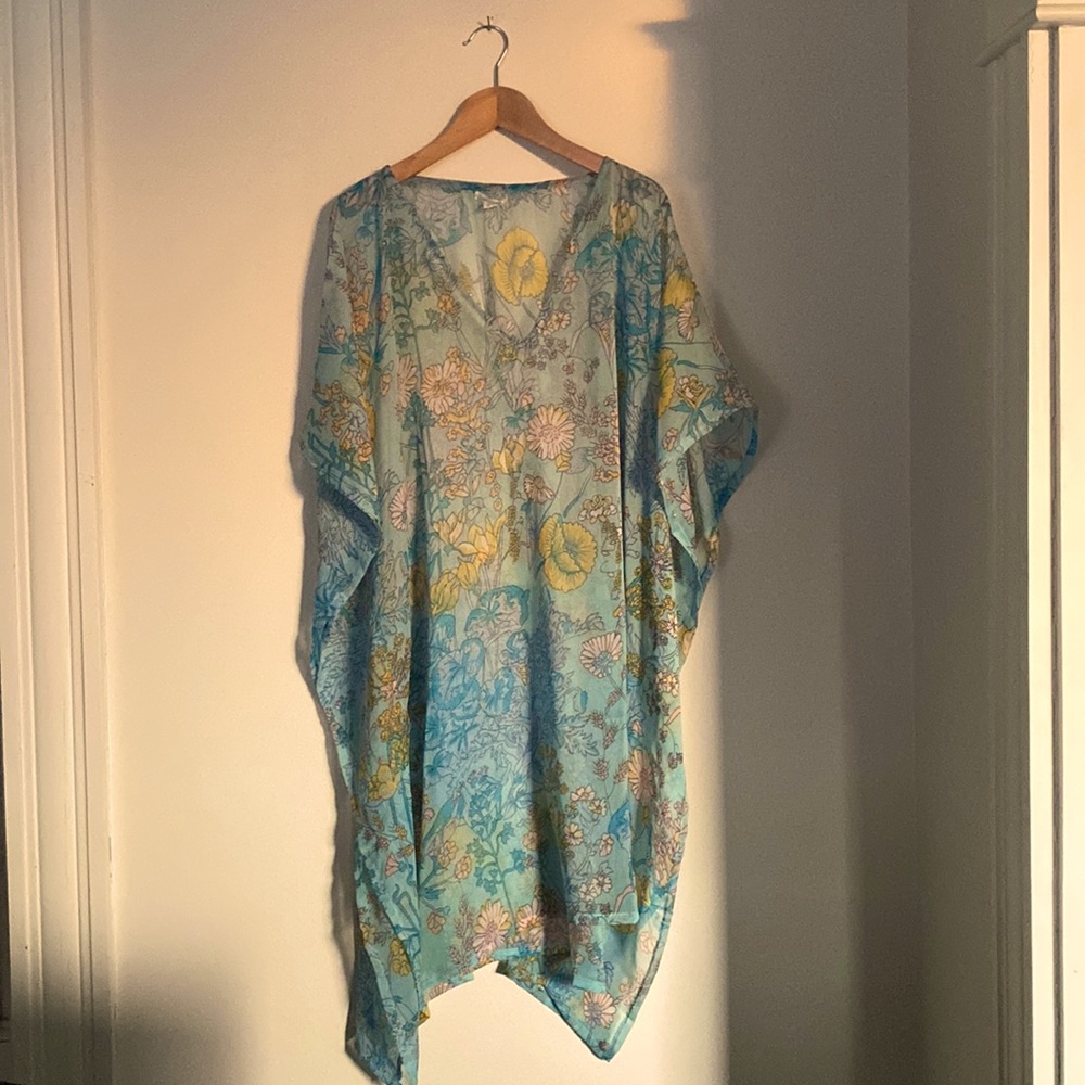 Beach Cover-up. Delicately fabric & flows with lights colors at the beach.